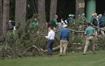 epa10564246 A large tree is on the ground near the 17th tee during a suspension in play due to weather, in the second round of the Masters Tournament at the Augusta National Golf Club in Augusta, Georgia, USA, 07 April 2023. The Augusta National Golf Club will hold the Masters Tournament from 06 April through 09 April 2023.  EPA/ERIK S. LESSER
