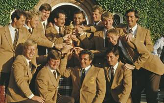 Tony Jacklin, Captain of Europe with team members Manuel Pinero, Ian Woosnam, Paul Way, Severiano Ballesteros, Sandy Lyle, Bernhard Langer, Sam Torrance, Howard Clark, Jose Rivero, Nick Faldo, Jose Maria Canizares and Ken Brown celebrate winning the 26th Ryder Cup Matches on 15 September 1985 at the Brabazon Course of The Belfry in Wishaw, Warwickshire, England. (Photo by David Cannon/Allsport/Getty Images)