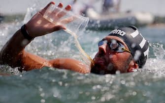 BUDAPEST, HUNGARY - JUNE 30: Dario Verani of Team Italy has a drink during the Open Water Swimming Men's 25km on day four of the Budapest 2022 FINA World Championships at Lake Lupa on June 30, 2022 in Budapest, Hungary. (Photo by Tom Pennington/Getty Images)