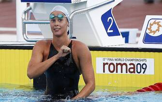 ROME, ITALY- JULY 28:  Federica Pellegrini of Italy celebrates after winning the women's 200m Freestyle semifinal in a world record ime during the 13th FINA World Championships at the Stadio del Nuoto on July 28, 2009 in Rome, Italy.  (Photo by ISM Agency/Getty Images)