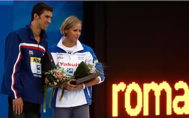 ROME - AUGUST 02:  Michael Phelps of United States and Federica Pellegrini of Italy receive the Fina Award during the 13th FINA World Championships at the Stadio del Nuoto on August 2, 2009 in Rome, Italy. (Photo by ISM Agency/Getty Images)