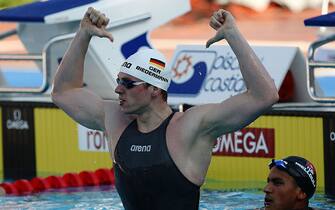 ROME - JULY 26:  Paul Biedermann of Germany celebrates breaking the world record, setting a new time of 3:40.07 seconds as he competes in the Men's 400m Freestyle Final during the 13th FINA World Championships at the Stadio del Nuoto on July 26, 2009 in Rome, Italy.  (Photo by Quinn Rooney/Getty Images)