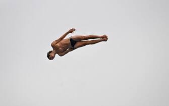 Italy's Andrea Barnaba competes in the Men's High Diving 27m round 1 on August 18, 2022 at the LEN European Aquatics Championships in Rome. (Photo by Alberto PIZZOLI / AFP) (Photo by ALBERTO PIZZOLI/AFP via Getty Images)