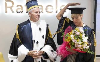 Italian former swimmer Federica Pellegrini (R) after receiving an honorary degree with a thesis on menstruation and sport by the university's rector Vilberto Stocchi  (L) at San Raffaele University in Rome, Italy, 29 September 2022. 
ANSA/MASSIMO PERCOSSI