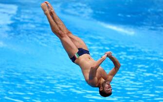 ROME, ITALY - AUGUST 18: Giovanni Tocci of Italy competes in the Men's 1m Springboard Final on Day 8 of the European Aquatics Championships Rome 2022 at the Stadio del Nuoto on August 18, 2022 in Rome, Italy. (Photo by Clive Rose/Getty Images)