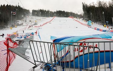 Barriers lie blown over in the finish area due to strong winds following the first run of the FIS Alpine Ski Women's Giant Slalom World Cup event at the panorama slope in Semmering, Austria, on December 28, 2020. - The Alpine Skiing World Cup in Semmering, whose first run was contested in the morning, was called off due to the wind blowing over the Austrian resort, the International Ski Federation (FIS) announced on December 28. (Photo by Florian SCHROETTER / various sources / AFP) / Austria OUT (Photo by FLORIAN SCHROETTER/EXPA/AFP via Getty Images)