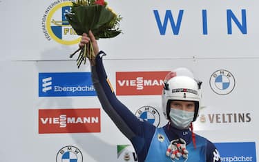 20 December 2020, North Rhine-Westphalia, Winterberg: Luge: Men's World Cup Sprint: Kevin Fischnaller from Italy celebrates second place. Photo: Caroline Seidel/dpa