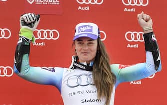 epa04673025 Tina Maze of Slovenia celebrates on the podium after taking the third place in the overall Slalom World Cup following the women's Slalom race at the Alpine Skiing World Cup in Meribel, France, 21 March 2015.  EPA/JEAN-CHRISTOPHE BOTT