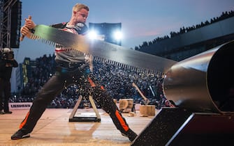 epa05979958 Stirling Hart of Canada competes in the single buck discipline during the Stihl Timbersports Champions Trophy at the Hamburg Cruise Center Altona in Hamburg, Germany, 20 May 2017.  EPA/Andreas Schaad / HANDOUT  HANDOUT EDITORIAL USE ONLY/NO SALES