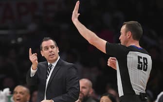 LOS ANGELES, CA - JANUARY 05: Head Coach Frank Vogel of the Los Angeles Lakers asks referee Josh Tiven #58 for a video review of a play against the Detroit Pistonsin the second half at Staples Center on January 5, 2020 in Los Angeles, California. Lakers won 106-99. NOTE TO USER: User expressly acknowledges and agrees that, by downloading and/or using this photograph, user is consenting to the terms and conditions of the Getty Images License Agreement. (Photo by John McCoy/Getty Images)