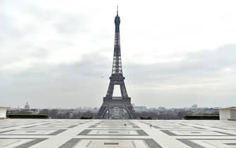 PARIS, FRANCE - MARCH 17: A general view of the Eiffel Tower on an empty Trocadero square on the first day of confinement due to an outbreak of coronavirus disease (COVID-19) on March 17, 2020 in Paris, France. Several European countries have closed borders, schools as well as public facilities, and have cancelled most major sports and entertainment events in order to prevent the spread of Coronavirus. The epidemic has exceeded 5,800 dead for more than 156,000 infections across the world. (Photo by Aurelien Meunier/Getty Images)