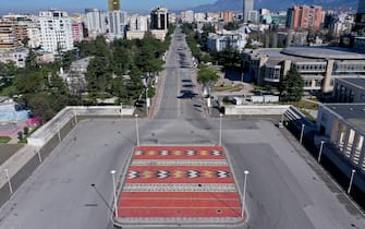 A picture taken on March 13, 2020, shows an aerial view of empty Tirana's outer ring. - Albania has stepped up measures to contain the spread of COVID 19 caused by the novel coronavirus and banned circulation of all cars (except ambulances and supplies) for 3 days and urged people to stay home as the number of infected people increased to 33. (Photo by Gent SHKULLAKU / AFP) (Photo by GENT SHKULLAKU/AFP via Getty Images)