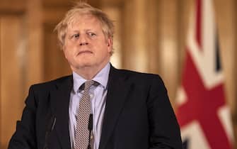 TOPSHOT - Prime Minister Boris Johnson gives a press conference on the ongoing COVID-19 situation in London on March 16, 2020. (Photo by Richard Pohle / POOL / AFP) (Photo by RICHARD POHLE/POOL/AFP via Getty Images)