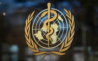 A photo taken on February 24, 2020 shows the logo of the World Health Organization (WHO) at their headquarters in Geneva. - Fears of a global coronavirus pandemic deepened on Monday as new deaths and infections in Europe, the Middle East and Asia triggered more drastic efforts to stop people travelling. (Photo by Fabrice COFFRINI / AFP) (Photo by FABRICE COFFRINI/AFP via Getty Images)