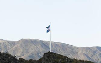 epa07781635 The Icelandic flag flies at Thingvellir national park in Reykjavik, Iceland, 19 August 2019 (issued 20 August 2019). German Chancellor Angela Merkel is visiting Iceland where she will join on 20 August the meeting of Nordic prime ministers as a guest of honor in the Icelandic capital Reykjavik.  EPA/STR