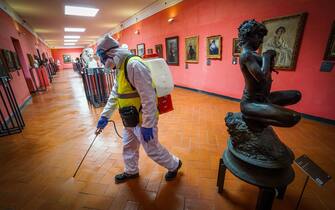 Specialized staff wearing protective face masks carry out the cleaning and sanitization of the rooms and the art paths of the Maschio Angioino Castle in Naples, southern Italy, 10 March 2020. In an attempt to stop the spreading of the novel coronavirus Covid-19, Italian Prime Minister Conte announced on 09 March the extending of coronavirus quarantine measures to the entire country starting on 10 March until 03 April. It will be possible to move only for 'proven work reasons' or 'serious family or health needs', he said. All public gatherings have been banned and people have been advised to stay at home.
ANSA/ CESARE ABBATE