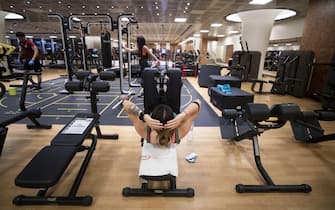 A customer works out on one of the machines inside at Heaven Fitness Gym in Rome, Italy, 25 May 2020.
ANSA/MASSIMO PERCOSSI
