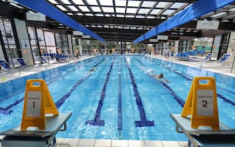 A person enjoys a swim  in the swimming  pool at the Due Ponti sports center who reopened today during the Phase Two of the coronavirus lockdown in Rome, Italy, 25 May 2020. ANSA/RICCARDO ANTIMIANI
