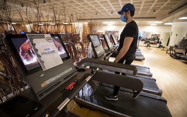A customer works out on one of the machines inside at Heaven Fitness Gym in Rome, Italy, 25 May 2020.
ANSA/MASSIMO PERCOSSI