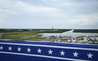 SpaceX Crew Dragon, with astronauts Bob Behnken and Doug Hurley on board is seen from the viewing area after the launch was cancelled due to bad weather, at Launch Complex 39A in Kennedy Space Center in Florida on May 27, 2020. - US President Donald Trump travels to Florida to see the historic first manned launch of the SpaceX Falcon 9 rocket with the Crew Dragon spacecraft, the first to launch from Cape Canaveral since the end of the space shuttle program in 2011. (Photo by Brendan Smialowski / AFP) (Photo by BRENDAN SMIALOWSKI/AFP via Getty Images)