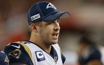 SANTA CLARA, CALIFORNIA - DECEMBER 21: Quarterback Jared Goff #16 of the Los Angeles Rams talks to teammates on the bench in the third quarter against the San Francisco 49ers at Levi's Stadium on December 21, 2019 in Santa Clara, California. (Photo by Lachlan Cunningham/Getty Images)