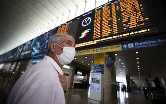 People, wearing protective face masks,at the Temini railway Station after the reopening of regional borders amid an easing of restrictions during P?hase 2 of the coronavirus emergency, Rome, Italy, 3 June 2020. ANSA/MASSIMO PERCOSSI
