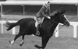 File photo dated 16/6/1960 of Queen Elizabeth II riding on the racecourse before the opening of the third day of the Royal Ascot meeting, when she took part in an unofficial 'race' and finished fourth to other members of her party of seven. More than any other interest, horses and ponies have been the Queen's passion throughout her long life. Issue date: Sunday January 30, 2022.