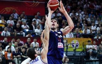 FOSHAN, CHINA - SEPTEMBER 04: #51 Boban Marjanovic of the Serbia National Team in action against #5 Alessandro Gentile of the Italy National Team during the 1st round of 2019 FIBA World Cup at GBA International Sports and Cultural Center on September 4, 2019 in Foshan, China. (Photo by Zhong Zhi/Getty Images)