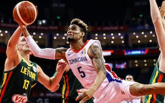 NANJING, CHINA - SEPTEMBER 09: Victor Liz(C) #5 of Dominican Republic in action against Eulis Baez #13 of Lithuania during 2nd round Group L match between Dominican Republic and Lithuania of 2019 FIBA World Cup at Nanjing Youth Olympic Sports Park Gymnasium on September 09, 2019 in Nanjing, China. (Photo by Shi Tang/Getty Images)