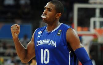 Al Horford, of Dominican Republic, celebrates after defeating Macedonia during pre-Olympic basketball game in Caracas on July 6, 2012. AFP PHOTO/Leo RAMIREZ        (Photo credit should read LEO RAMIREZ/AFP/GettyImages)