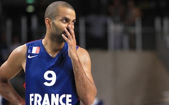 France's Tony Parker reacts during a friendly basketball match between France and Serbia on August 15, 2013 in Antibes, southeastern France as part of the preparation for the 2013 EuroBasket in Slovenia. AFP PHOTO / JEAN CHRISTOPHE MAGNENET        (Photo credit should read JEAN CHRISTOPHE MAGNENET/AFP via Getty Images)