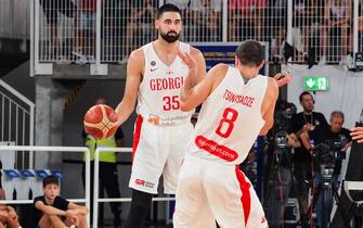 Goga Bitadze (Georgia) and George Tsintsadze (Georgia) with Niccolo Mannion (Italy)  and Giampaolo Ricci (Italy)    during  World Cup 2023 Qualifiers - Italy vs Georgia, Iternational Basketball Teams in Brescia, Italy, August 27 2022