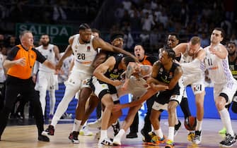 epa10595432 Players scuffle during the Euroleague basketball match between Real Madrid and Partizan Belgrade at Wizink Center in Madrid, Spain, 27 April 2023.  EPA/Juan Carlos Hidalgo