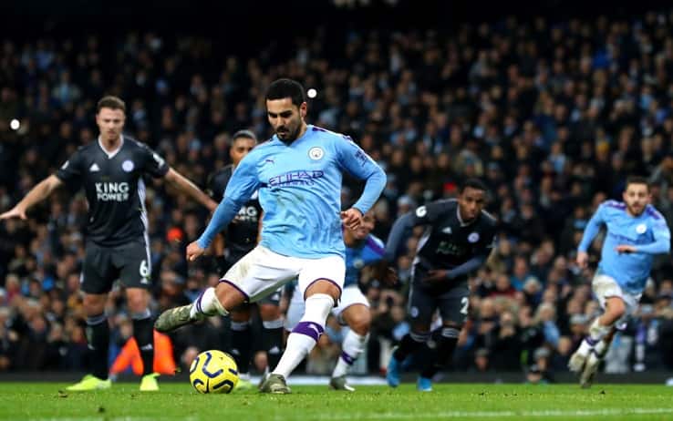 MANCHESTER, ENGLAND - DECEMBER 21: Ilkay Gundogan of Manchester City scores a penalty for his team during the Premier League match between Manchester City and Leicester City at Etihad Stadium on December 21, 2019 in Manchester, United Kingdom. (Photo by Chloe Knott - Danehouse/Getty Images)