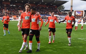 Lorient's players celebrate a goal of Lorient's French midfielder Sylvain Marveaux (3rdL) during the French Cup football match between Lorient (FC Lorient) and Brest (Stade Brestois) on January 5, 2020, at the Moustoir stadium in Lorient, western France. (Photo by Sebastien SALOM-GOMIS / AFP) (Photo by SEBASTIEN SALOM-GOMIS/AFP via Getty Images)