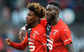 Rennes' French midfielder Yann Gboho (L) and Rennes' French defender Joris Gnagnon celebrate their victory at the end of the French L1 football match between Stade Rennais Football Club and Toulouse Football Club at the Roazhon Park, in Rennes, northwestern France on October 27, 2019. (Photo by JEAN-FRANCOIS MONIER / AFP) (Photo by JEAN-FRANCOIS MONIER/AFP via Getty Images)