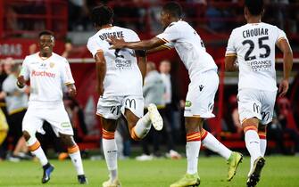 Lens' French defender Jean-Kevin Duverne (2nd L) celebrates with his teammates after scoring a goal during the French L1-L2 second leg play-off football match between Dijon (L1) and Lens (L2), at the Gaston Gerard stadium in Dijon, central-eastern France on June 2, 2019. (Photo by JEAN-PHILIPPE KSIAZEK / AFP)        (Photo credit should read JEAN-PHILIPPE KSIAZEK/AFP via Getty Images)
