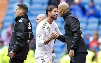 MADRID, SPAIN - SEPTEMBER 14: (L-R) Sergio Ramos of Real Madrid, coach Zinedine Zidane of Real Madrid during the La Liga Santander  match between Real Madrid v Levante at the Santiago Bernabeu on September 14, 2019 in Madrid Spain (Photo by David S. Bustamante/Soccrates/Getty Images)