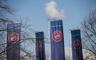epa08300463 (FILE) - UEFA Flags are pictured next to the entrance of the UEFA Headquarters in Nyon, Switzerland, 06 April 2016 (re-issued on 17 March 2020). The UEFA EURO 2020 has been postponed to 2021 amid the coronavirus COVID-19 pandemic, the Norwegian Football Association (NFF) announced on 17 March 2020.  EPA/JEAN-CHRISTOPHE BOTT *** Local Caption *** 52687177
