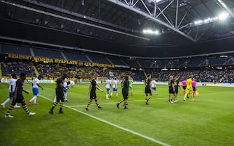STOCKHOLM, SWEDEN - JULY 17: Players from AIK and FC Ararat-Armenia enter the pitch prior a UEFA Champions League qualification match between AIK and FC Ararat-Armenia at Friends Arena on July 17, 2019 in Stockholm, Sweden. (Photo by Michael Campanella/Getty Images)