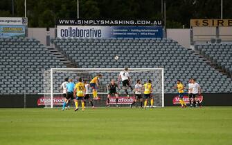 GOSFORD, AUSTRALIA - MARCH 20: Goal mouth action showing empty stadium due to the fan lockout from coronavirus during the round 24 A-League match between the Central Coast Mariners and Melbourne City at Central Coast Stadium on March 20, 2020 in Gosford, Australia. (Photo by Ashley Feder/Getty Images)