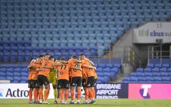 GOLD COAST, AUSTRALIA - MARCH 20: The Brisbane Roar huddle during the round 27 A-League match between the Brisbane Roar and the Newcastle Jets at Cbus Super Stadium on March 20, 2020 in Gold Coast, Australia. (Photo by Albert Perez/Getty Images)