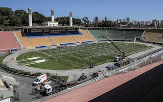 General view of the construction site of a temporary field hospital to house coronavirus patients for their isolation and recovery at Pacaembu stadium, in Sao Paulo, Brazil on March 23, 2020. - Brazil's top football clubs are handing over their stadiums to allow health authorities to turn them into field hospitals and clinics to fight the coronavirus pandemic. (Photo by NELSON ALMEIDA / AFP) (Photo by NELSON ALMEIDA/AFP via Getty Images)