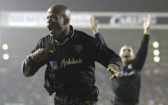 LEEDS - DECEMBER 12:  Dely Valdes of Malaga celebrates scoring their second goal during the UEFA Cup, third round second leg, match between Leeds United and Malaga at Elland Road on December 12, 2002 in Leeds, England. (Photo by Clive Mason/Getty Images).