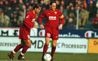 09 APR 2001: Gabriel Batistuta and Francesco Totti (R) of Roma during the SERIE A 25th  Round League match between Fiorentina and Roma, played at the Comunale stadium,  Florence .
