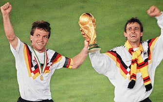 West German midfielder Lothar Matthaeus (L) and forward Pierre Littbarski celebrate with the World Cup trophy after their team beat the defending champions Argentina 1-0 on a penalty kick by defender Andreas Brehme in the World Cup final, 08 July 1990 in Rome. Germany will play against Brazil the final match of the 2002 FIFA World Cup Korea-Japan in Yokohama, Japan, 30 June.  "I have a feeling we are going to be world champions", "we are up against the best individual players in the world - but we too have world-class players" said the goalkeeper Oliver Kahn. Germany won the World title three times (1954, 1974 and 1990). ANSA