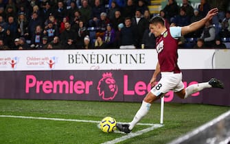 BURNLEY, ENGLAND - NOVEMBER 09: Ashley Westwood of Burnley in takes a corner kick during the Premier League match between Burnley FC and West Ham United at Turf Moor on November 09, 2019 in Burnley, United Kingdom. (Photo by Clive Brunskill/Getty Images)