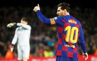 epa08277235 FC Barcelona's Lionel Messi reacts after scoring the 1-0 lead from the penalty spot during the Spanish La Liga soccer match between FC Barcelona and Real Sociedad at Nou Camp stadium in Barcelona, Spain, 07 March 2020.  EPA/QUIQUE GARCIA