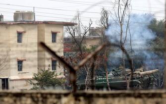 epa06515417 An Indian Army tank moves outside the army family quarters where alleged terrorists are believed to be holed up, during an attack on Sunjwan Military station in Jammu, the winter capital of Kashmir, India, 11 February 2018. According to the news reports, three terrorists and two Junior Commissioned Officers (JCOs) and three soldiers were killed while ten others, including five women and two children have been injured after terrorists belonging to Jaish-e-Mohammed (JeM) attacked the Sunjwan Indian Army camp in Jammu and Kashmir.  EPA/JAIPAL SINGH