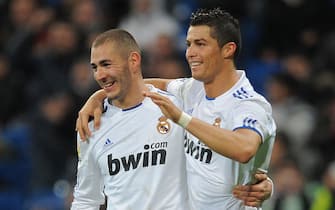 MADRID, SPAIN - DECEMBER 22:  Cristiano Ronaldo (R) of Real Madrid celebrates with Karim Benzema after scoring his second goal against Levante in the first leg round of 16 Copa del Rey match between Real Madrid and Levante at Estadio Santiago Bernabeu on December 22, 2010 in Madrid, Spain.  (Photo by Denis Doyle/Getty Images)